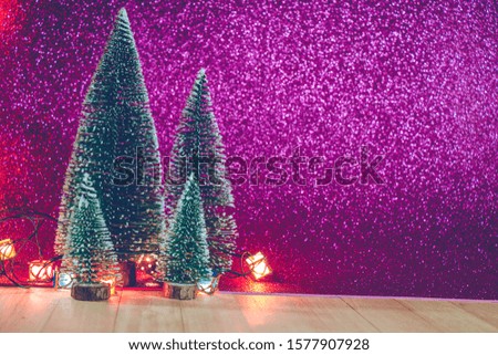 Christmas tree and ornament, light up glitter background. Merry christmas and happy new year night.