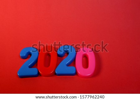 2020 full color with a red background.