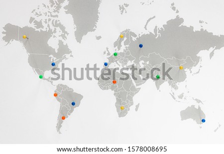World map with colorful pushpins. Travel concept