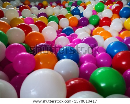 More color plastic toy balls for the children's pool dry. Picture background, wallpaper, texture, pattern, plastic ball.