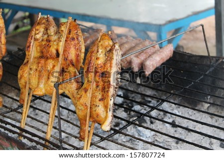 Grilled chicken on the grill.