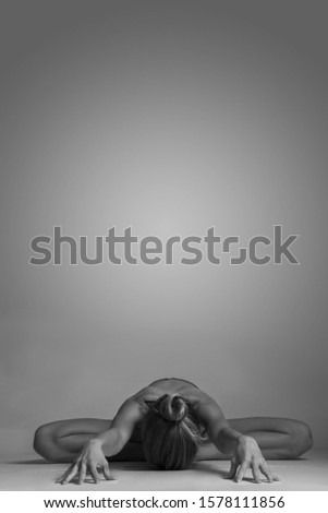 Girl doing yoga poses, poster ready, artistic black and white photo, fitness yoga instructor  