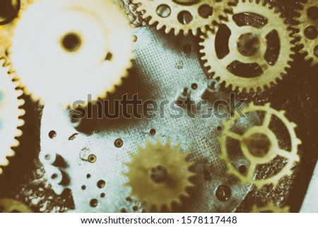 Closeup gears and cogs. Mechanism. Mechanic action. 
