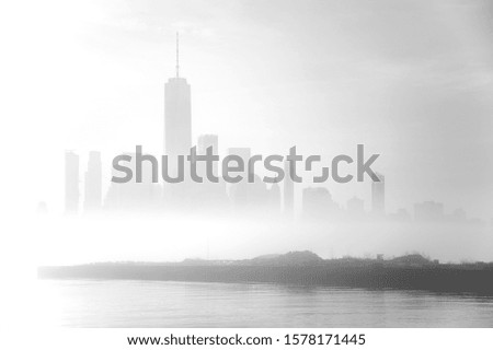 New York City skyline during a misty morning sunrise