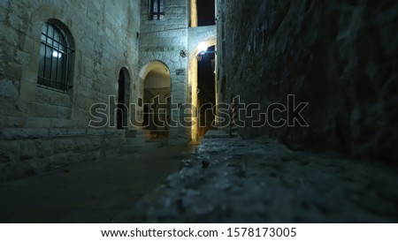 Low key Picture of a dark alley in the old city.