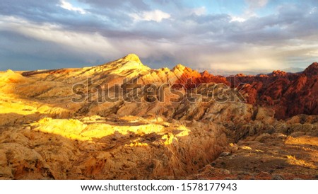 A sunset is taking the colors of the stones in the Valley of fire to a higher level, this picture is hooten in the direction of the rainbow point.
