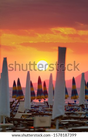 Dramatic sunset sunrise over the italian tirrenean coastline,Tuscany, Marina di Grosseto, Castiglione Della Pescaia, Italy.