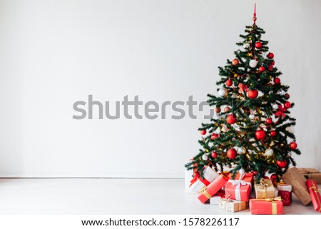 Christmas tree with red gifts decor home for new year postcard as background