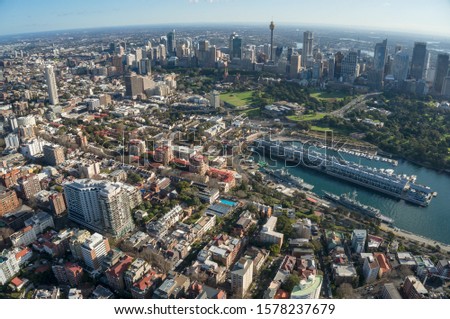 Aerial cityscape of Sydney suburbs of CBD, Woolloomooloo and Potts Point with residential and commercial property and real estate. Sydney centre aerial view 