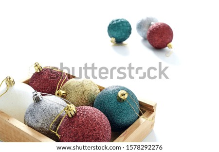 A studio photo of christmas baubles