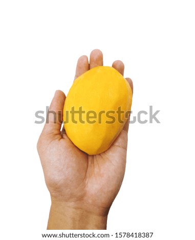 Peeled mango in the left palm isolated on white background. Fresh mango fruit in closeup