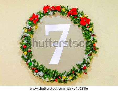 he lucky number 7 in the center of the wreath at Christmas.