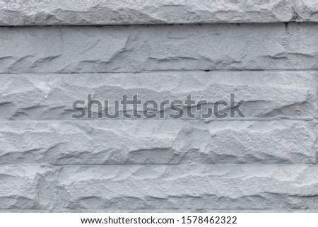Limestone Wand-front view, viele Häuserblocks