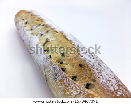 French Sesame Baguette on a white background.