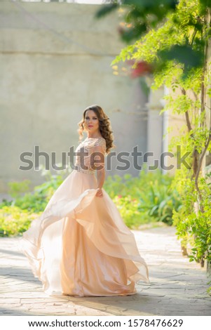 Women 28-35 years old in a public park in a romantic old-style dress. Royalty-Free Stock Photo #1578476629