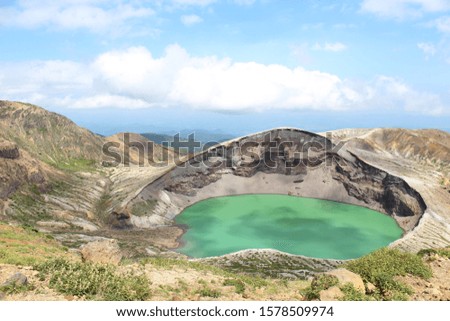 emerald green crater lake in the Zao Mountain Range