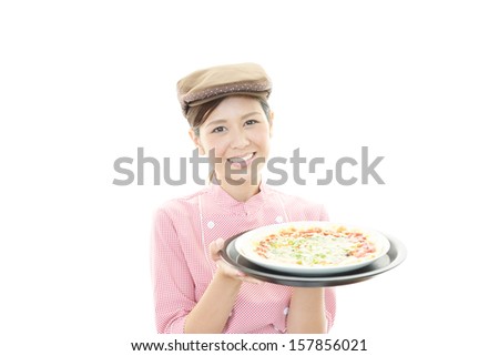Waitress delivering meal to table