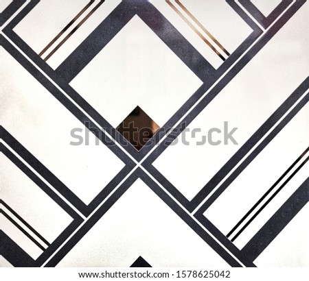 Black and white ceramic tiles with geometric pattern for wall and floor decoration. Marble concrete stone surface background. Texture for interior design project. 