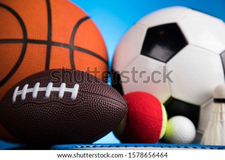 Assorted sports equipment, Winner background