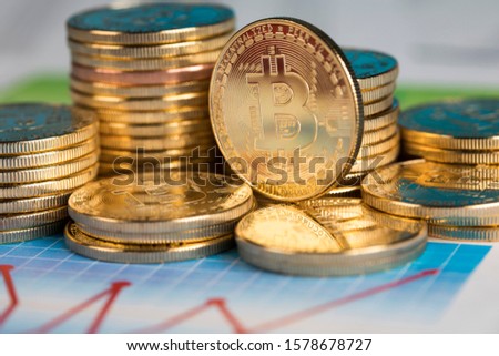 Golden Bitcoin Coin, virtual money, financial chart
