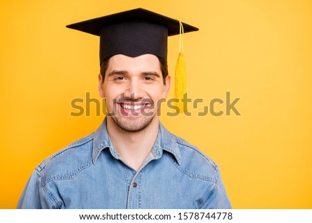 Photo of cheerful positive man having graduated from university inspired to achieve goals in his future life isolated vivid color background