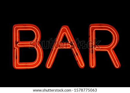 Simple BAR message in red neon capital letter lights 