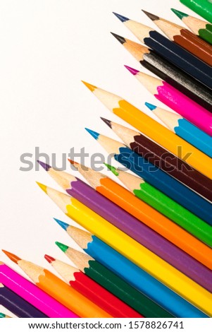 Background of stationery items notepad pencils shot closeup.