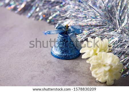 Christmas decorations blue bell and white cones