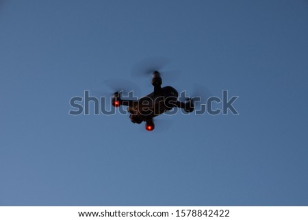 drone flying with blue sky background
