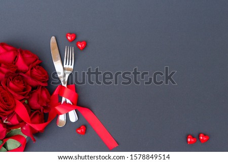 Served table for Valentines Dinne with fork and knife, top view with copy space