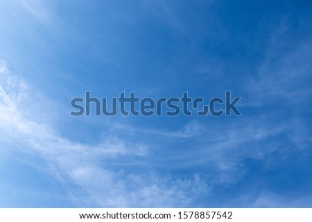 Blue sky with cross clouds on a clear day and good weather in the morning, fluffy and soft white clouds