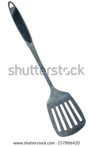 Spatula in the kitchen on a white background Royalty-Free Stock Photo #157886420