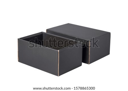 Black carton gift box with cover, opened, isolated
