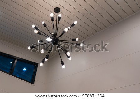 Modern ceiling lamp design steel rod shape with wooden wall for interior decoration contemporary
