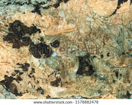 Colored layers of marble, background, stone texture.