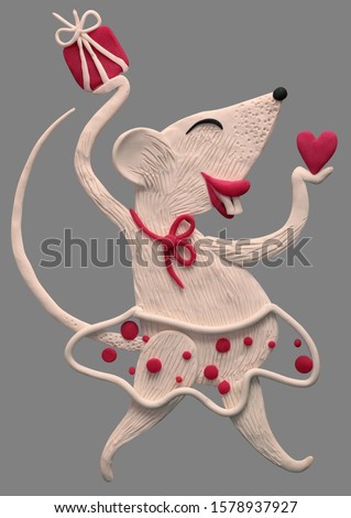 plasticine figurine in the image of a white mouse or rat according to the eastern calendar. which brings love, fun, change, realization, holiday to the future, dedicated to 2020 new year