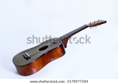 Vector image with an acoustic guitar theme