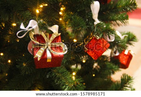 Christmas tree decoration. Toys on the Christmas tree. Selective focus.
