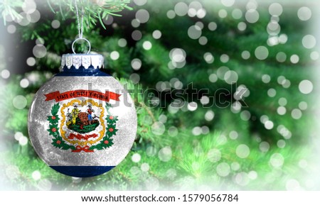 Christmas and New Year background with a flag State of West Virginia