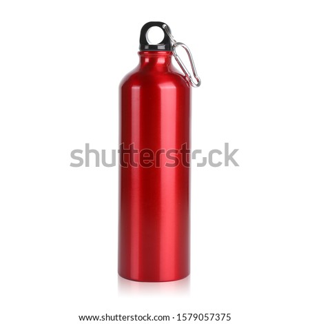 Lush Lava Red Stainless Steel Aluminium Outdoor Hiking Glossy Metal Water Bottle with Cap & Handle Isolated on White Background. For Hot & Cold Beverages. Design Template for Mock-up, Branding. Studio Royalty-Free Stock Photo #1579057375