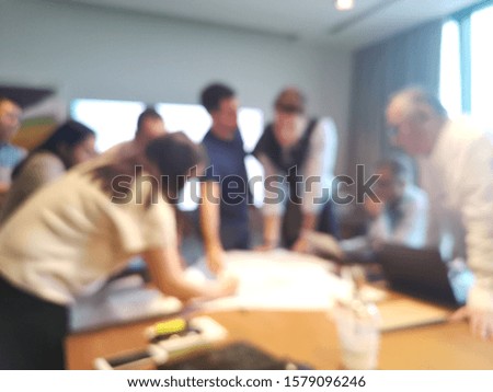 Blur focus of businesspeople discussing together in conference room during meeting at office
