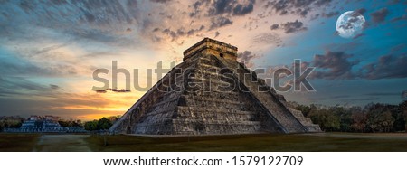 chitchenitza during sunset with the moon Royalty-Free Stock Photo #1579122709