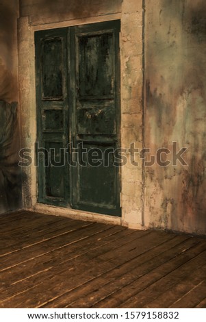 Dark and gloomy studio of painter in old house