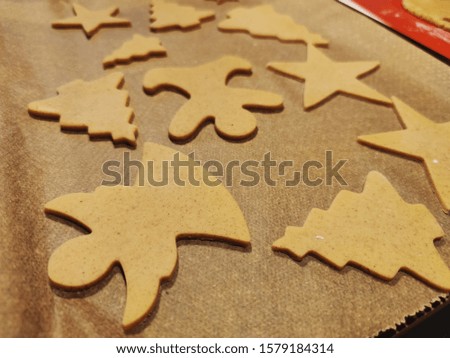 Close up of childs hands making christmas ginger cookies