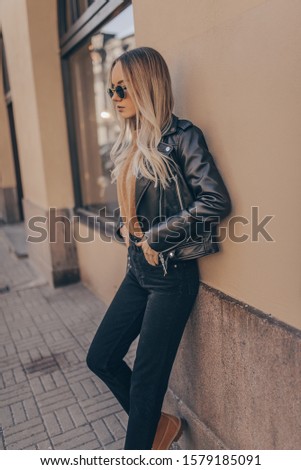 Stylish woman posing in outdoor