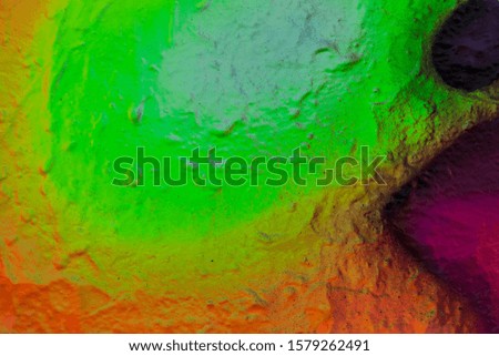 Beautiful bright colorful street art graffiti background. Abstract creative spray drawing fashion colors on the walls of the city. Urban Culture, pink , red , orange , green, crimson , purple texture