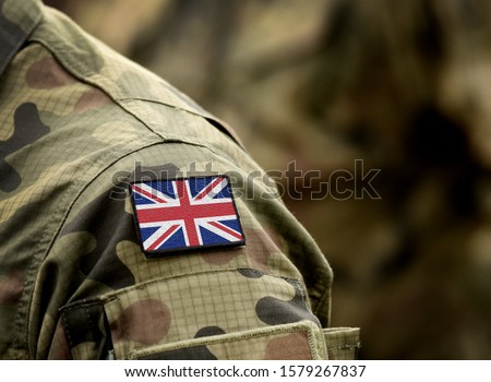 Flag of United Kingdom on military uniform. UK Army. British Armed Forces, soldiers. Collage. Royalty-Free Stock Photo #1579267837