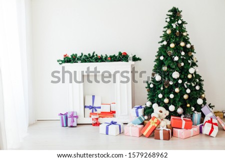 Christmas tree with gifts decor for the new year holiday winter interior room