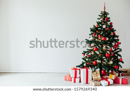 Christmas tree with red decor gifts for the new year holiday winter