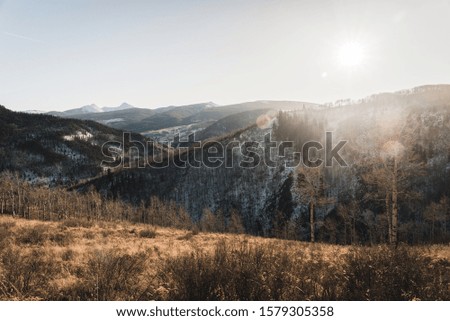 Landscape view of snow dusted hills near Vail, Colorado. 
